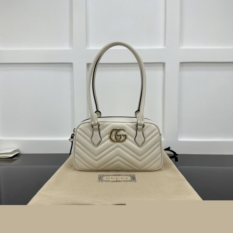 G*u*i top handle bags